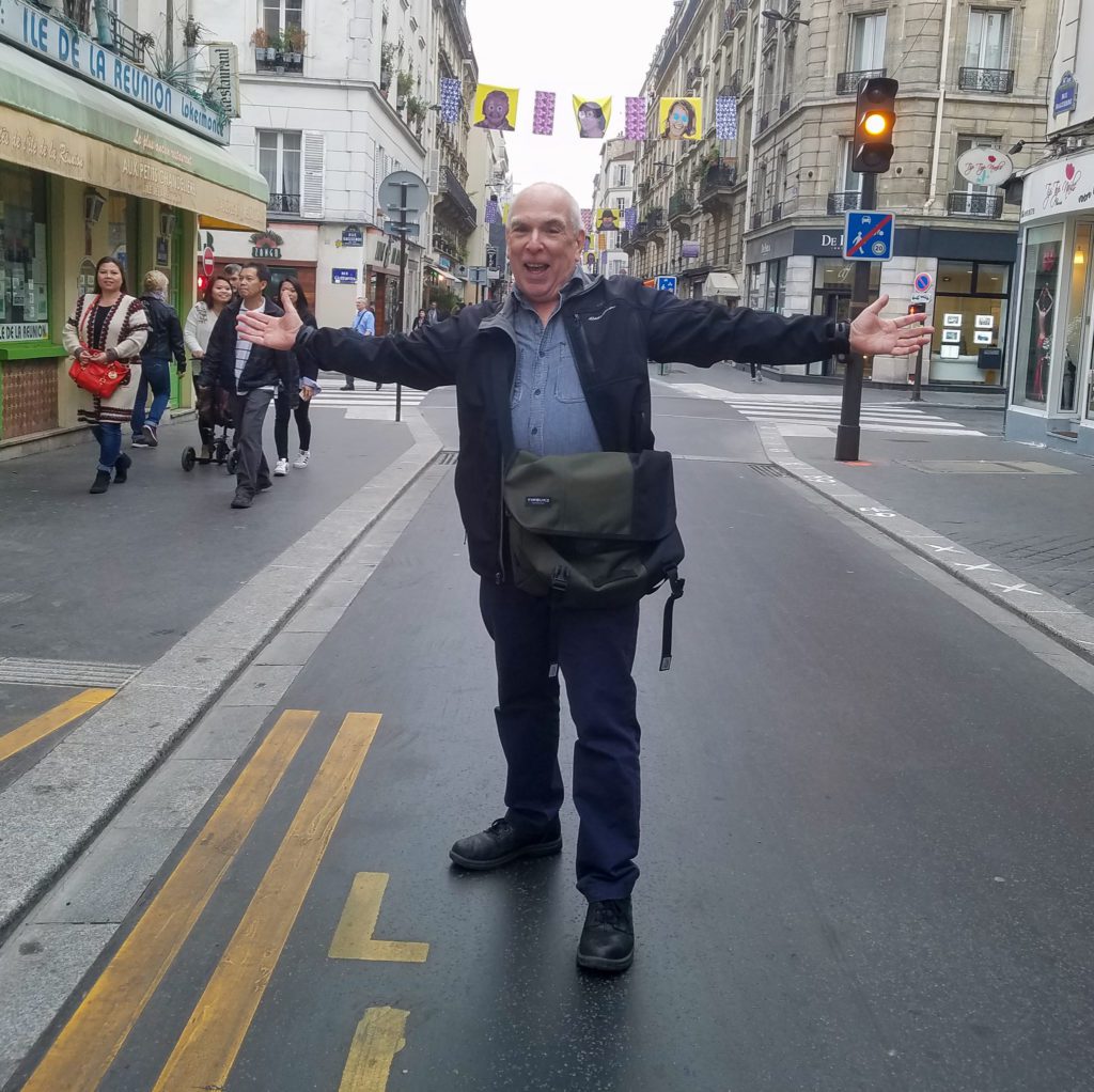 Fred Standing with Arms Wide Open on Rue De Guerre Paris the Road